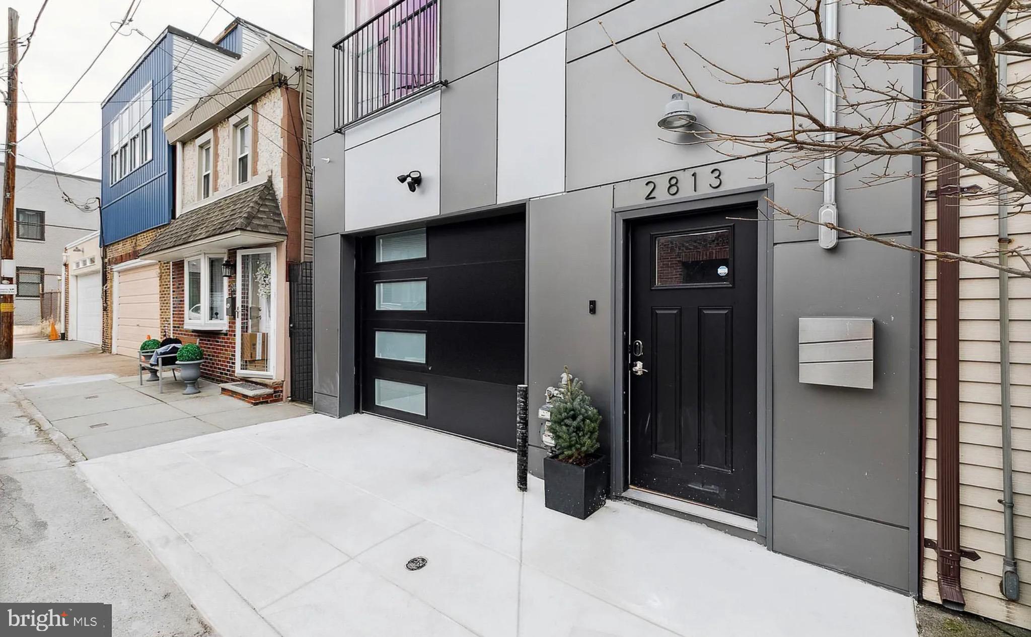 2813 Tilton Street Philadelphia, PA 19134 - Photo 30 of 33 a view of a house with a patio