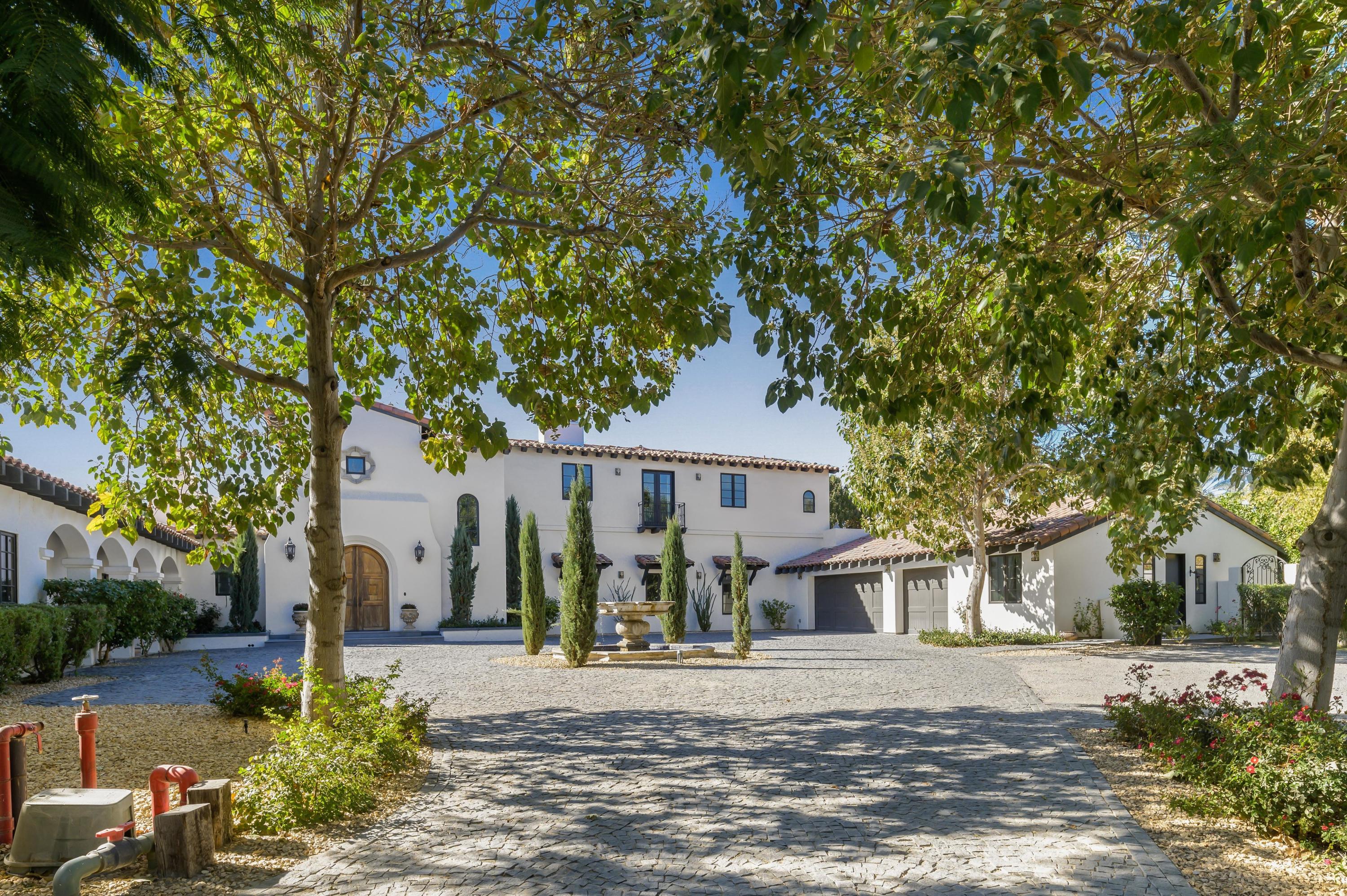 82425 Ave 55 Thermal, CA 92274 - Photo 1 of 46 a front view of a house with garden