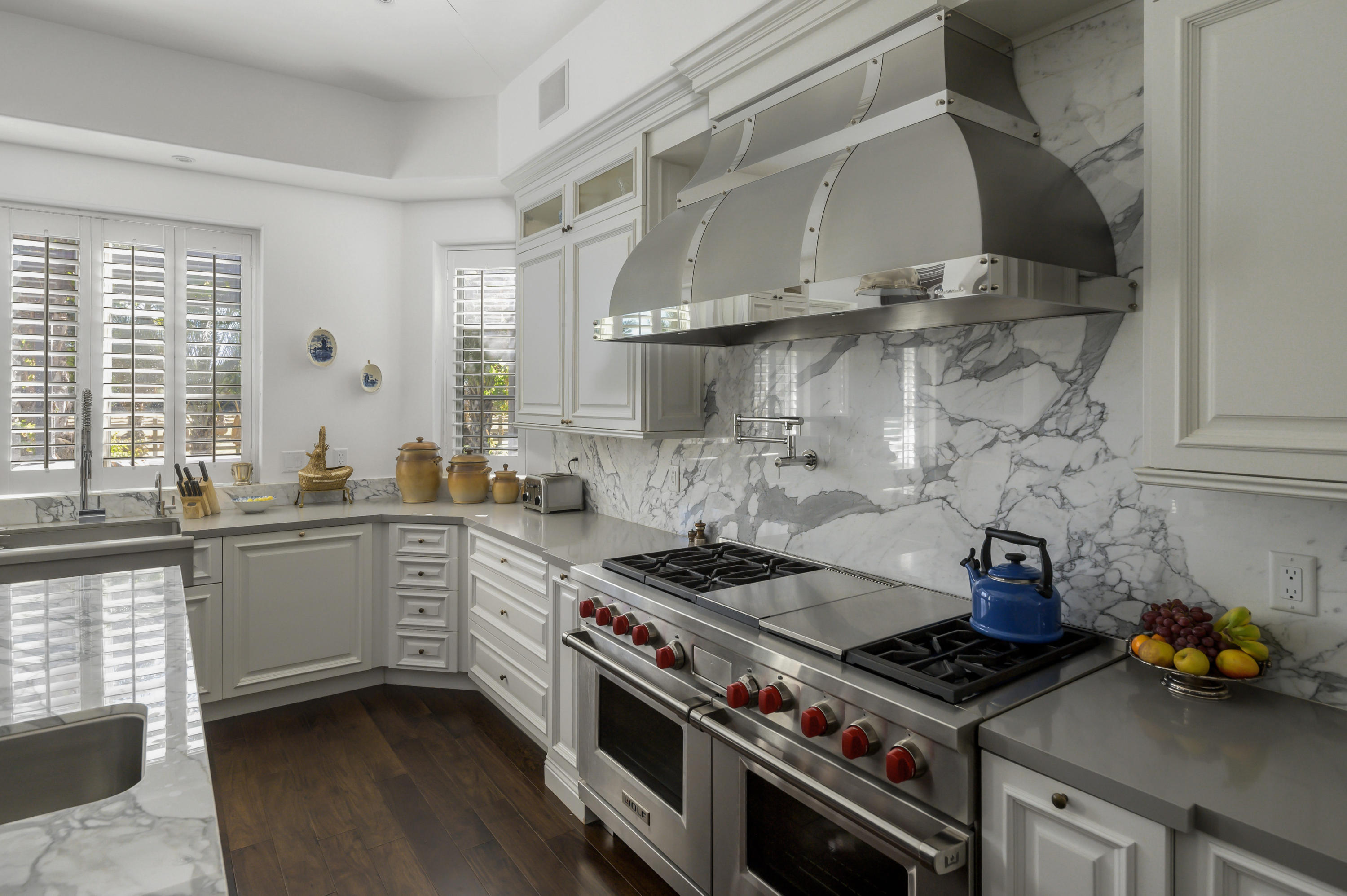 82425 Ave 55 Thermal, CA 92274 - Photo 13 of 46 a kitchen with stainless steel appliances a stove and cabinets