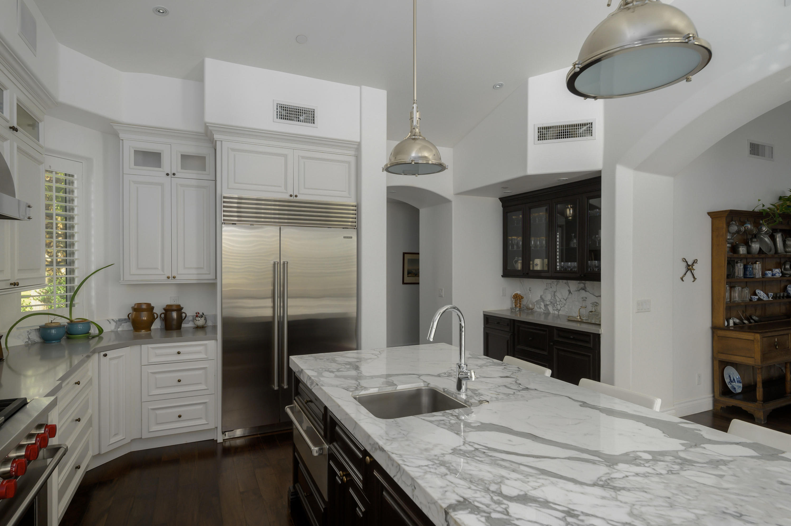 82425 Ave 55 Thermal, CA 92274 - Photo 14 of 46 a kitchen with a refrigerator and a sink