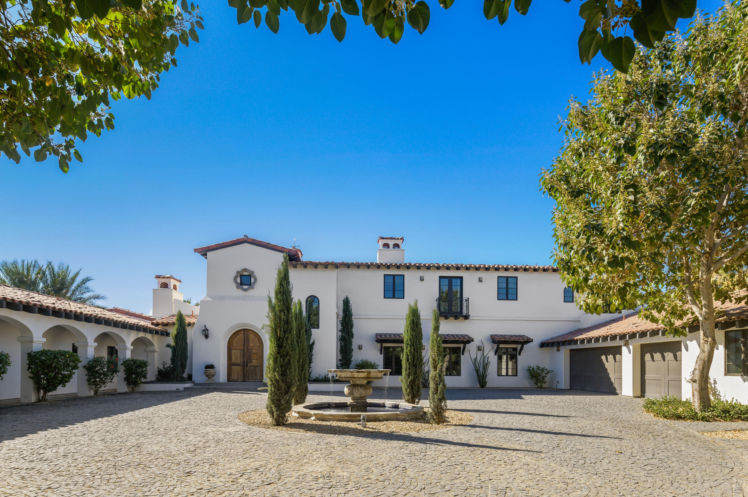 82425 Ave 55 Thermal, CA 92274 - Photo 3 of 46 an outdoor space view with a couple of cars parked in front of house