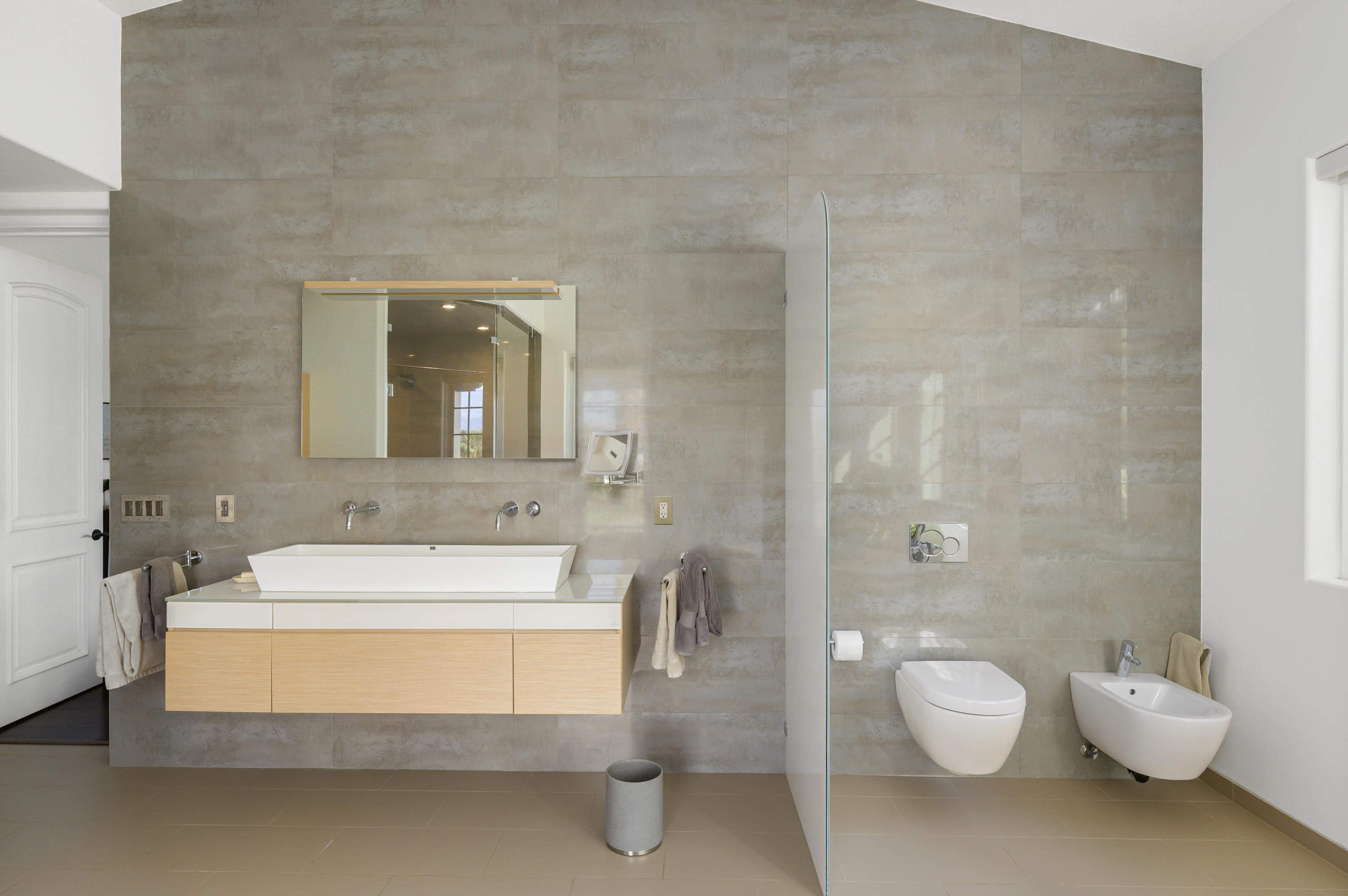 82425 Ave 55 Thermal, CA 92274 - Photo 28 of 46 a spacious bathroom with a double vanity sink toilet and a mirror