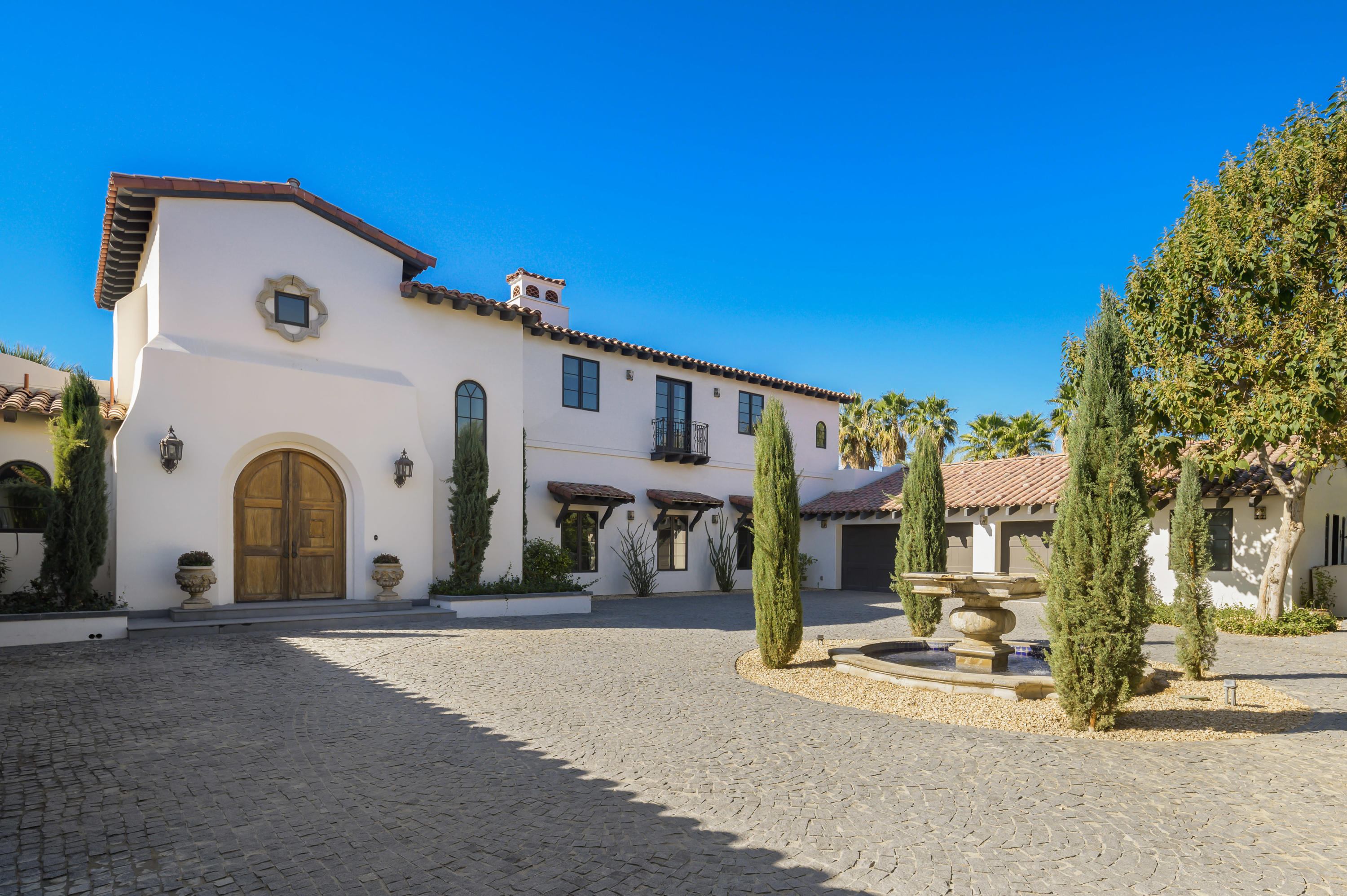 82425 Ave 55 Thermal, CA 92274 - Photo 4 of 46 a front view of a house with a garage