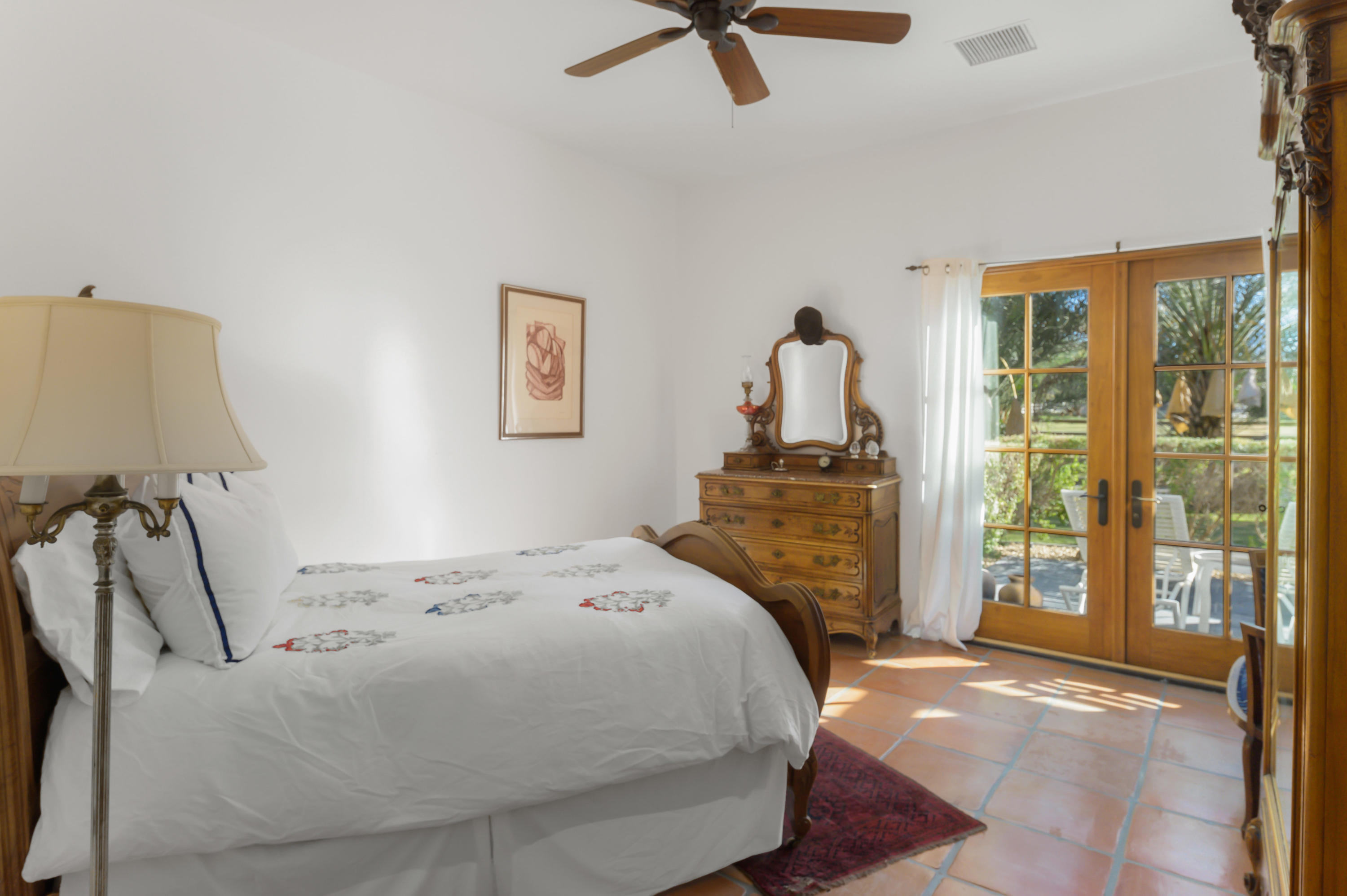 82425 Ave 55 Thermal, CA 92274 - Photo 41 of 46 a bedroom with a bed and a dresser