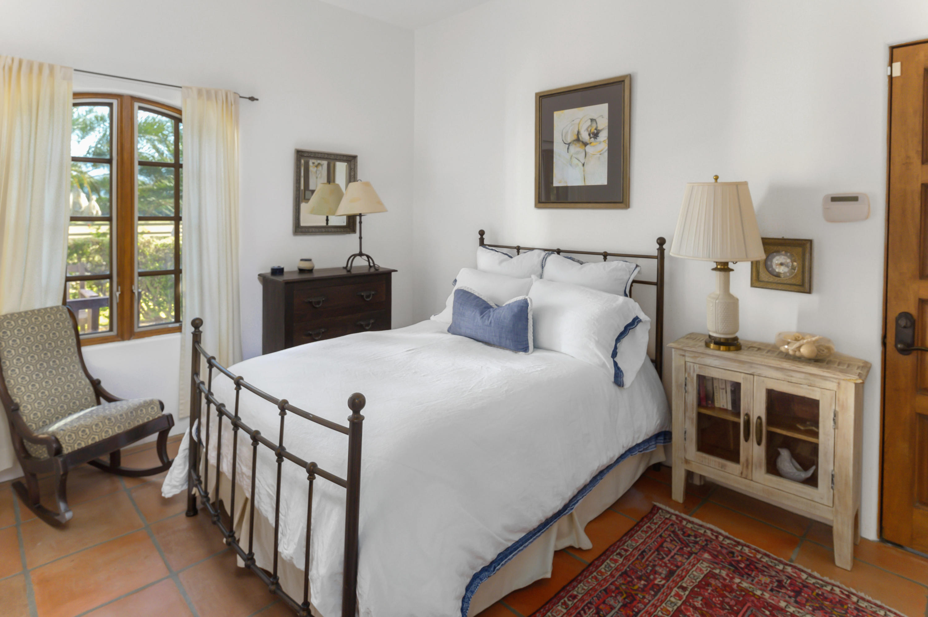 82425 Ave 55 Thermal, CA 92274 - Photo 42 of 46 a bedroom with a bed and a couch