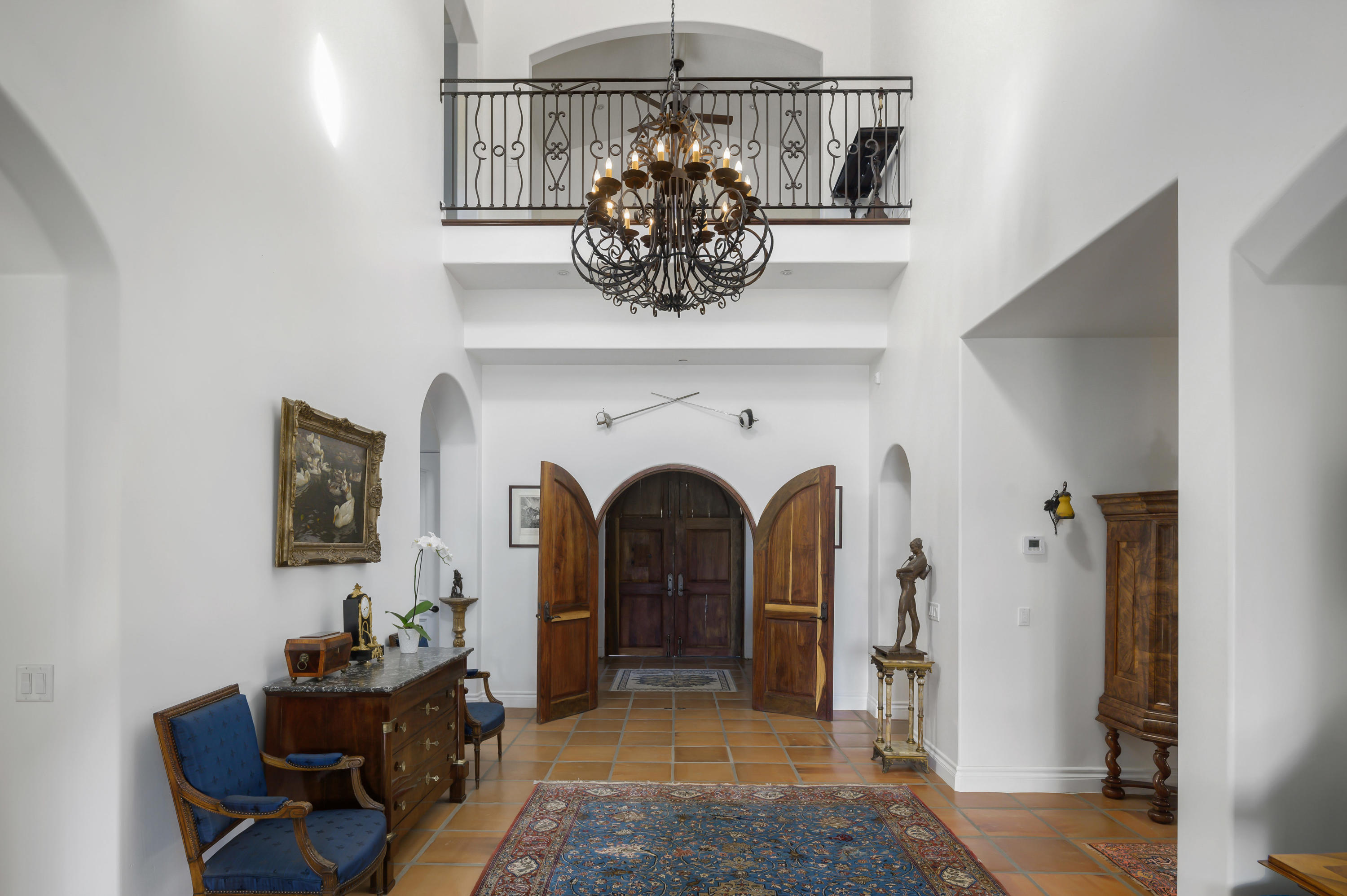 82425 Ave 55 Thermal, CA 92274 - Photo 9 of 46 a view of a hallway with a chandelier