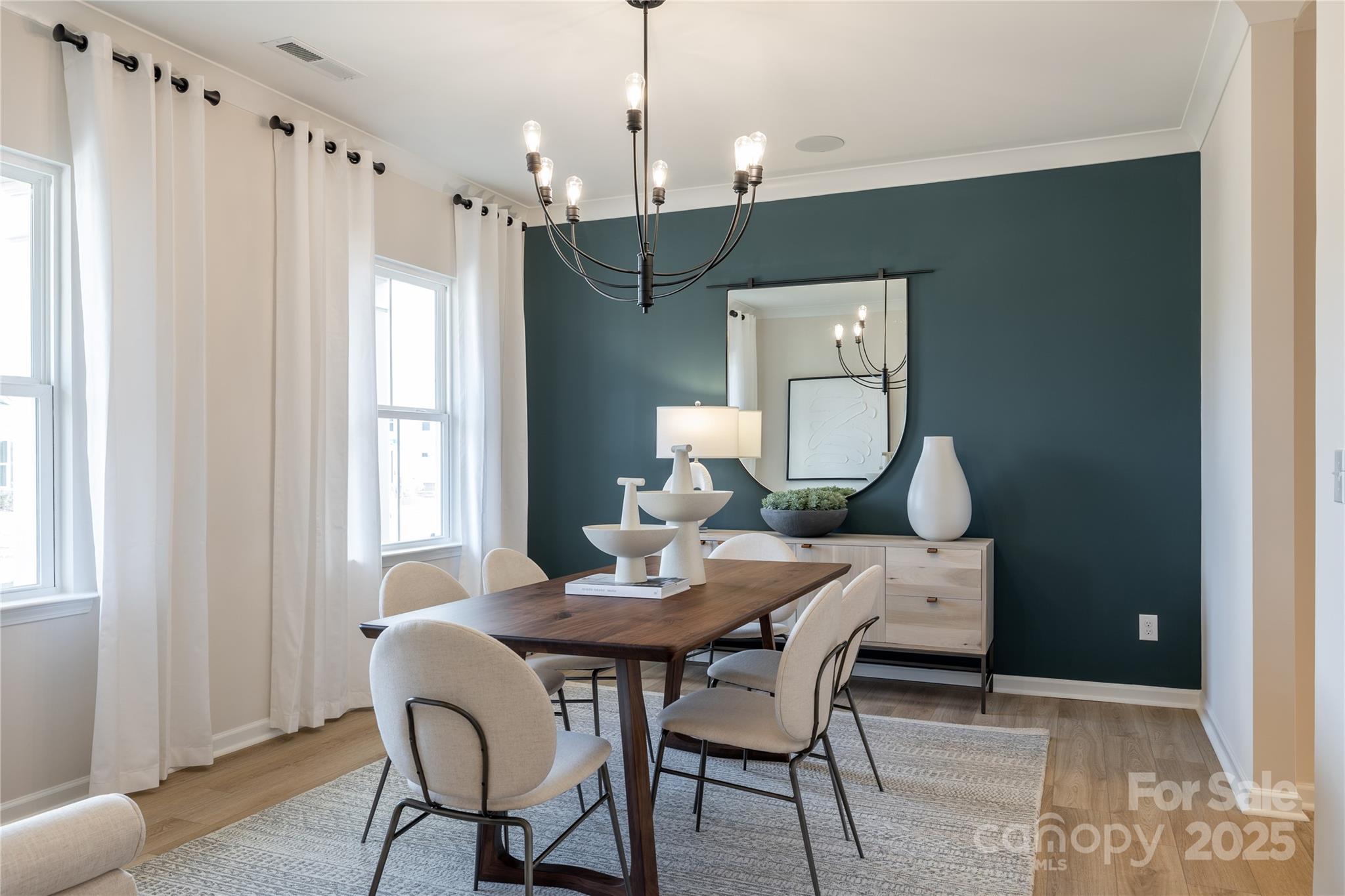 5819 Stewarts Lndg Road, Unit 65 Charlotte, NC 28215 - Photo 3 of 8 a dining room with furniture and window