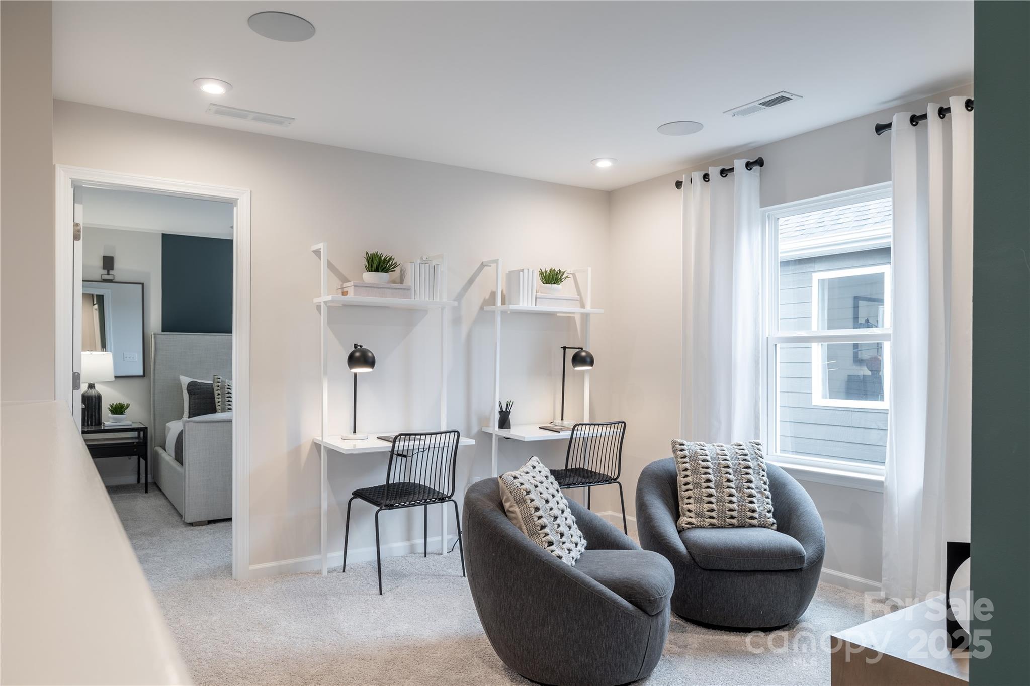 5819 Stewarts Lndg Road, Unit 65 Charlotte, NC 28215 - Photo 7 of 8 a living room with furniture and a window