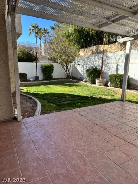 2152 Falcon Pointe Lane Henderson, NV 89074 - Photo 11 of 11 Fenced backyard with a pergola and a patio