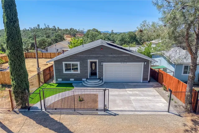 a house with trees in the background