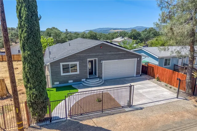 a house view with a garden space