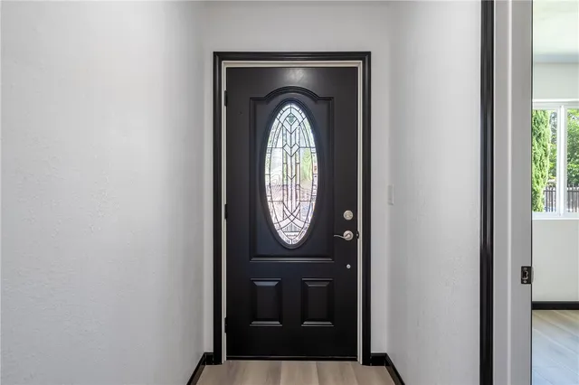 a view of a hallway with entryway