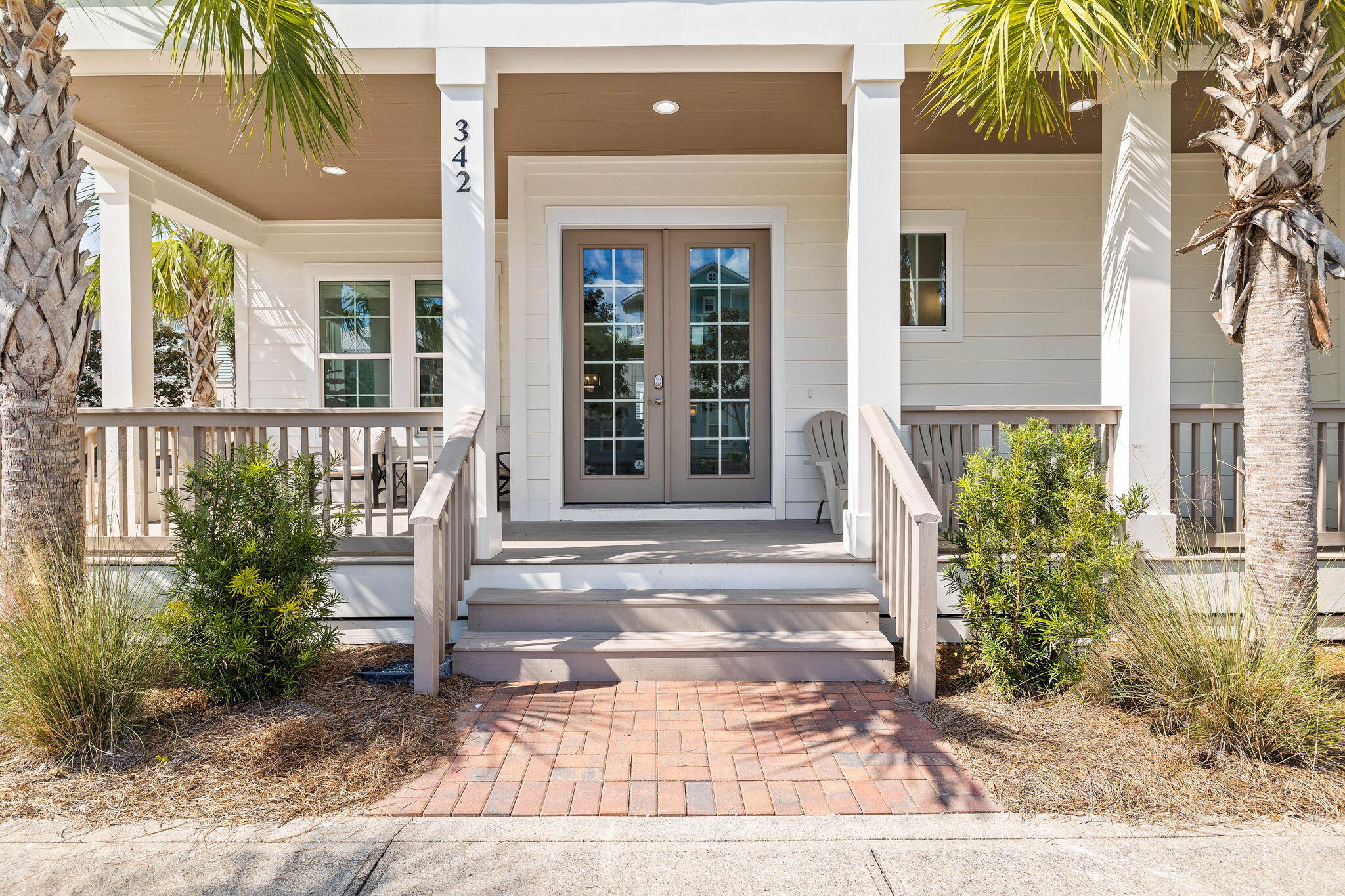 342 Beach Bike Way Inlet Beach Inlet Beach, FL 32461 - Photo 2 of 86 a front view of a house with a porch
