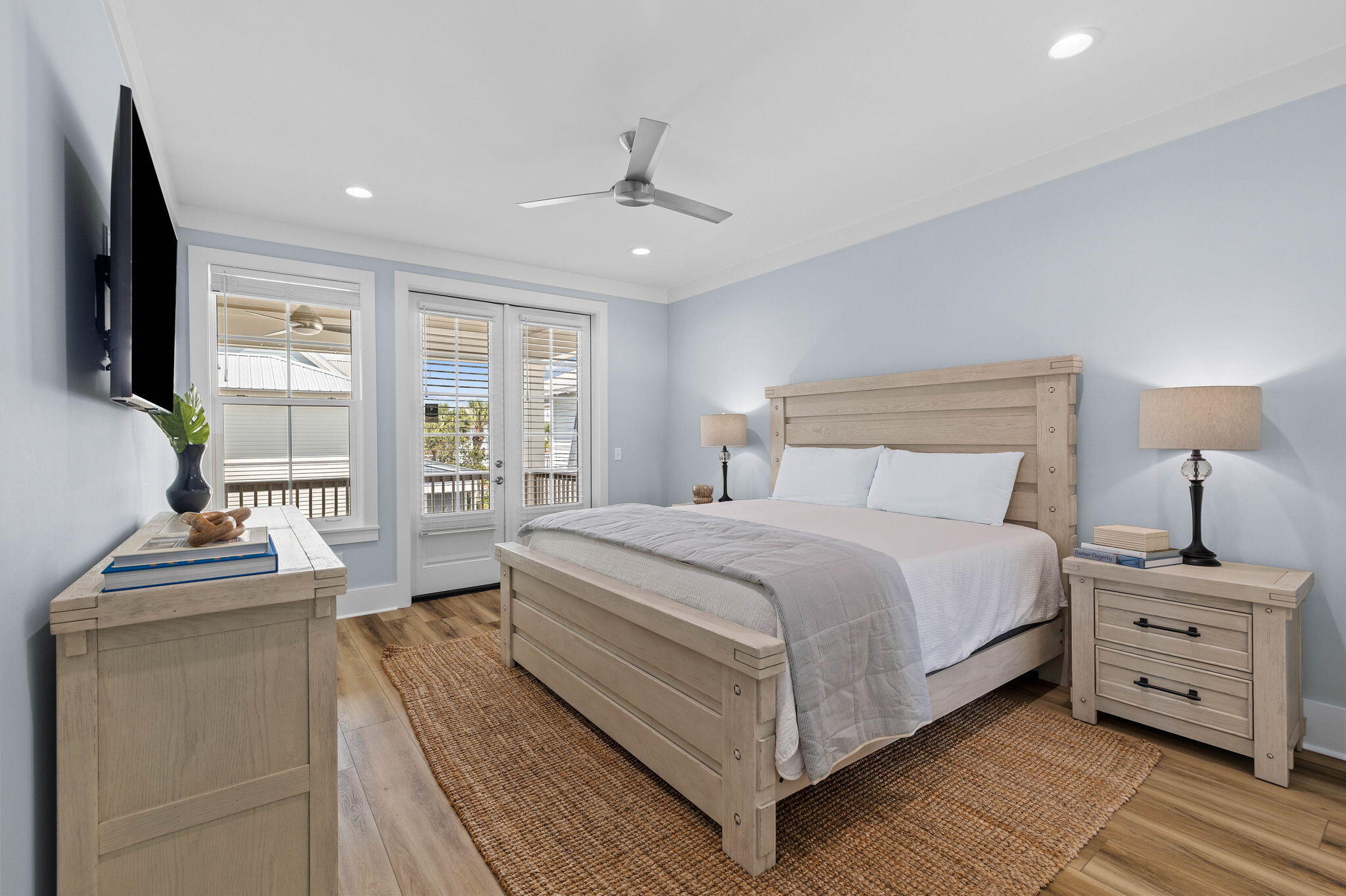 342 Beach Bike Way Inlet Beach Inlet Beach, FL 32461 - Photo 38 of 86 a bedroom with a bed and a flat tv screen on dresser