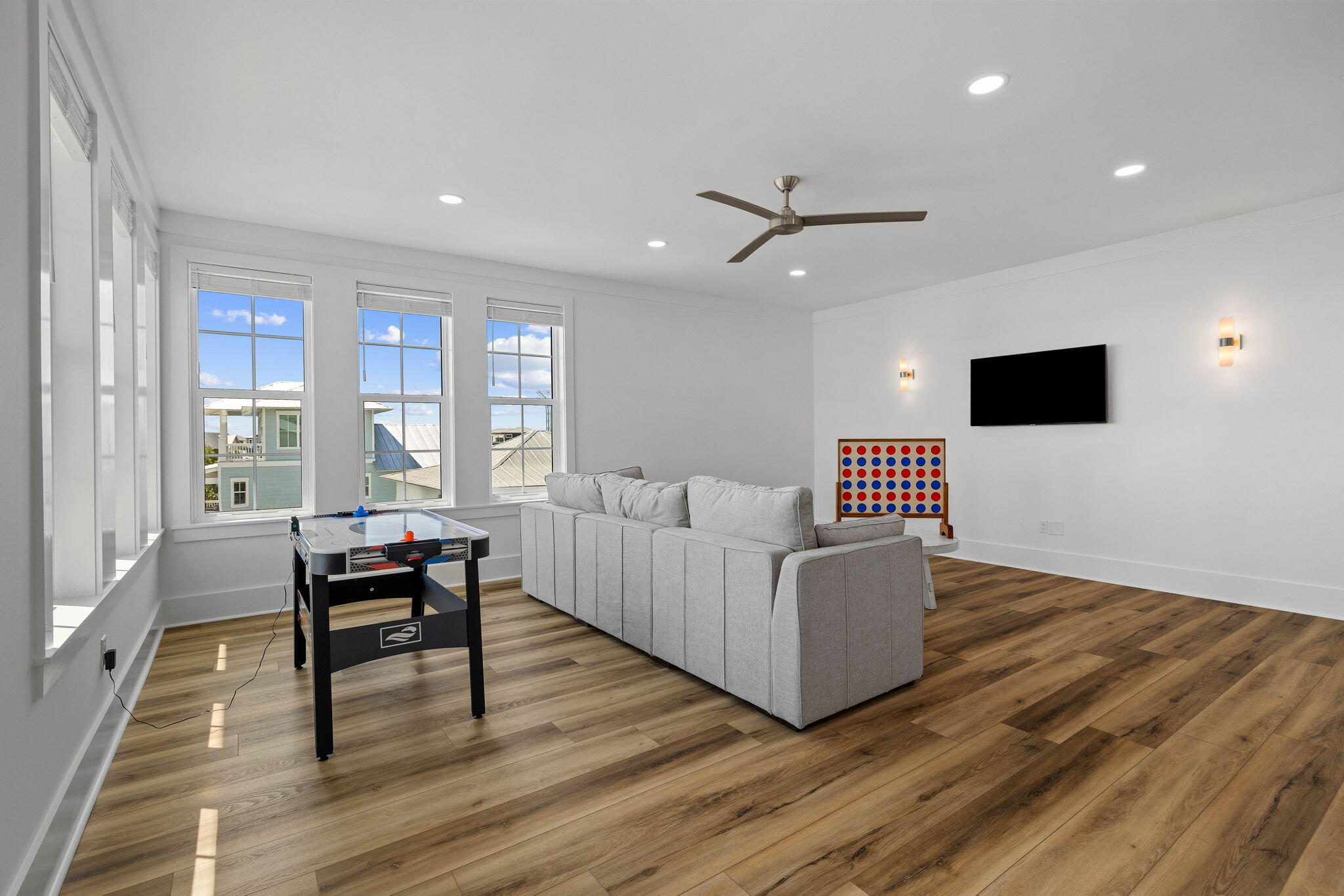 342 Beach Bike Way Inlet Beach Inlet Beach, FL 32461 - Photo 56 of 86 a living room with furniture and a flat screen tv