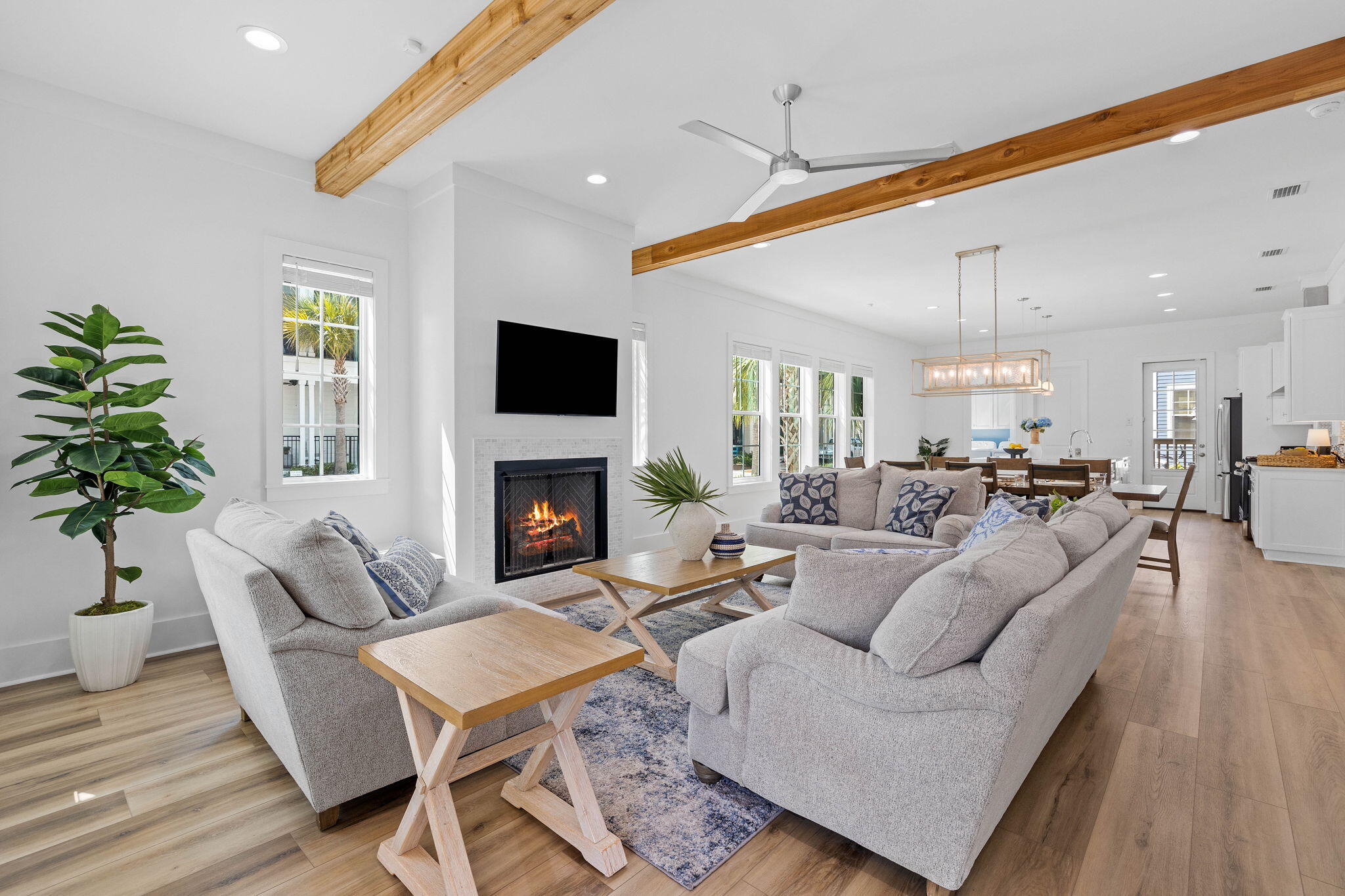 342 Beach Bike Way Inlet Beach Inlet Beach, FL 32461 - Photo 6 of 86 a living room with furniture a fireplace and a potted plant