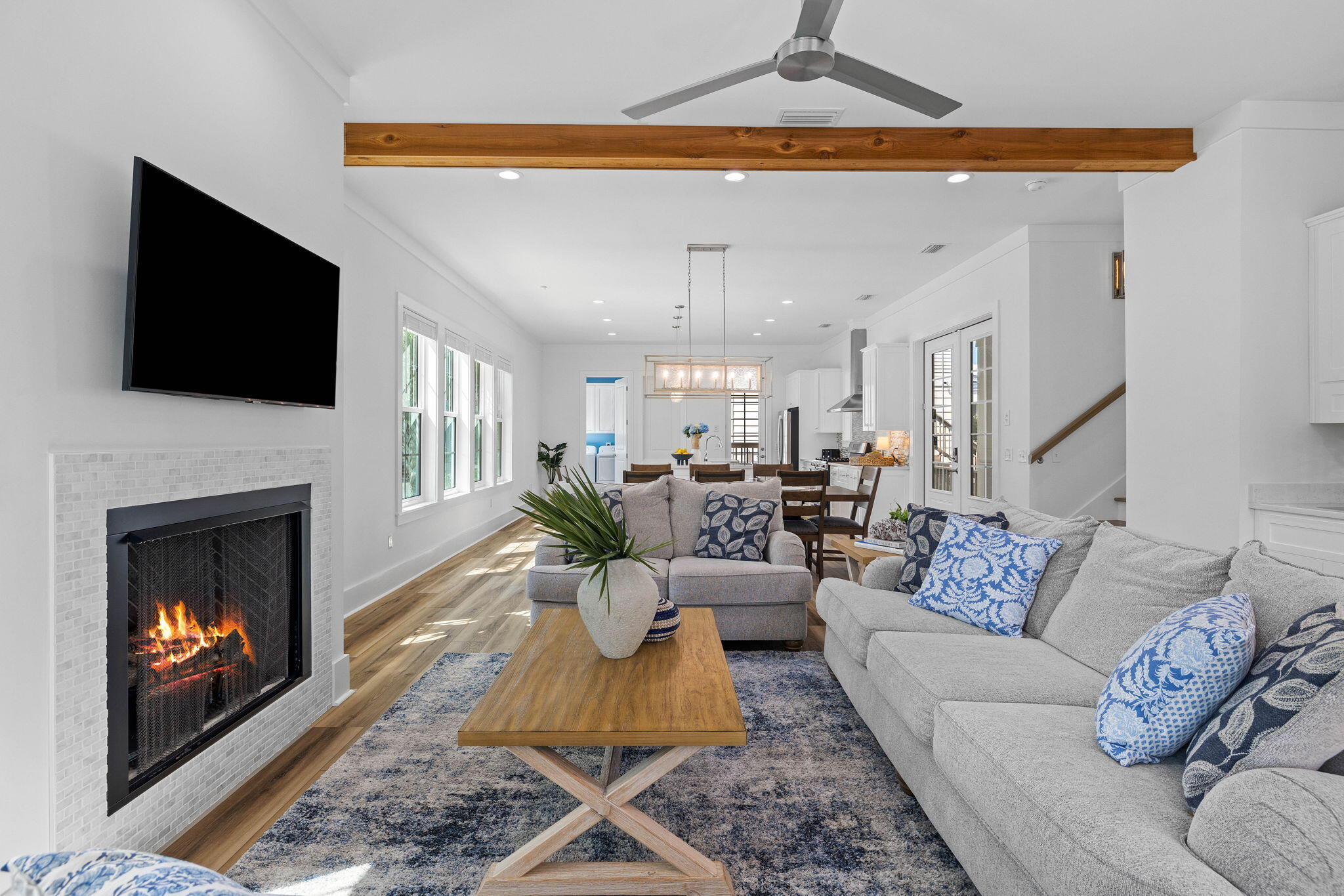 342 Beach Bike Way Inlet Beach Inlet Beach, FL 32461 - Photo 9 of 86 a living room with furniture a fireplace and a flat screen tv