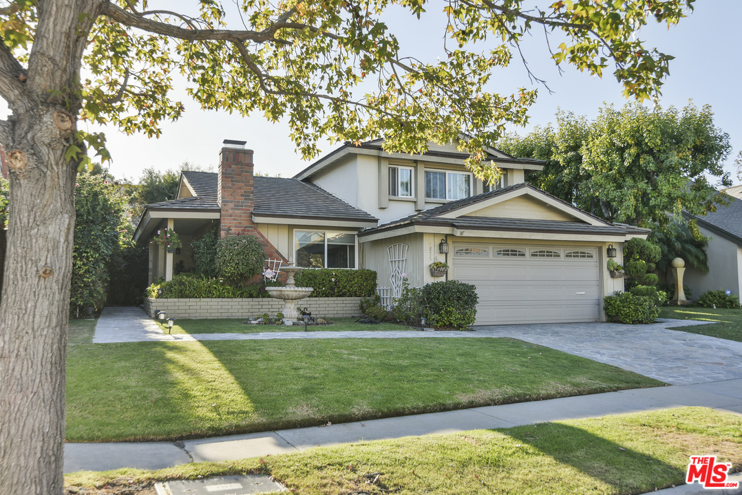 4875 Patrae Street Los Angeles, CA 90066 - Photo 1 of 23 front view of a house with a yard