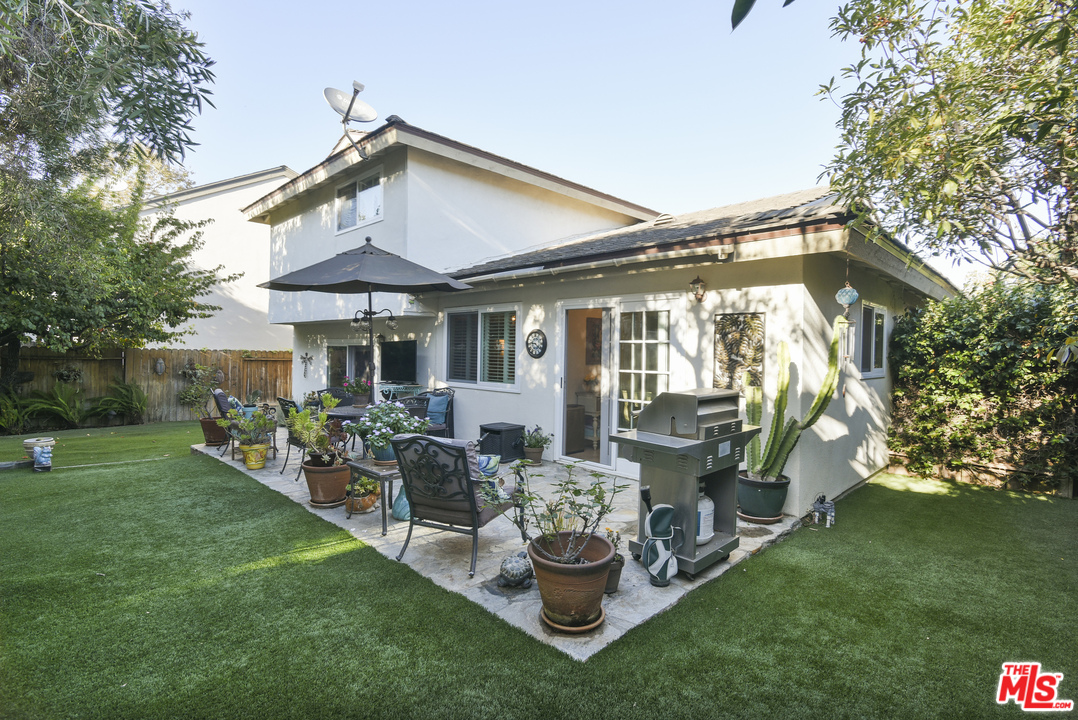 4875 Patrae Street Los Angeles, CA 90066 - Photo 21 of 23 a front view of house with a garden and patio
