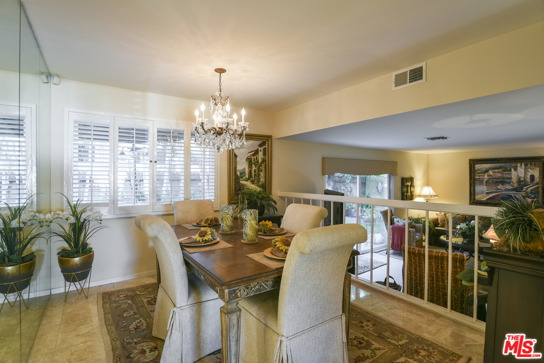 4875 Patrae Street Los Angeles, CA 90066 - Photo 6 of 23 a view of a dining room with furniture window and outside view