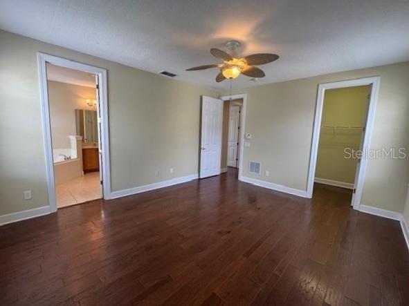 1442 Stickley Avenue Celebration, FL 34747 - Photo 20 of 46 a view of an empty room with wooden floor and a window
