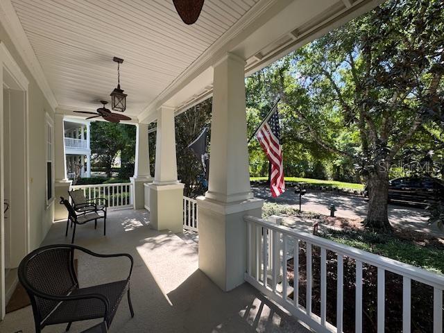 1442 Stickley Avenue Celebration, FL 34747 - Photo 2 of 46 a view of a chairs and table in patio