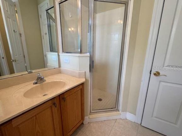 1442 Stickley Avenue Celebration, FL 34747 - Photo 23 of 46 a bathroom with a sink and a mirror