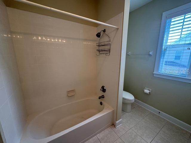 1442 Stickley Avenue Celebration, FL 34747 - Photo 29 of 46 a bath room with a toilet and a bath tub