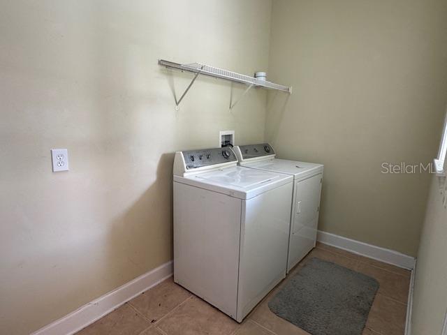 1442 Stickley Avenue Celebration, FL 34747 - Photo 36 of 46 a utility room with dryer and washer