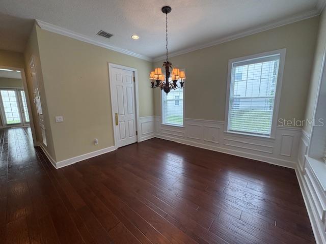 1442 Stickley Avenue Celebration, FL 34747 - Photo 4 of 46 an empty room with wooden floor and windows