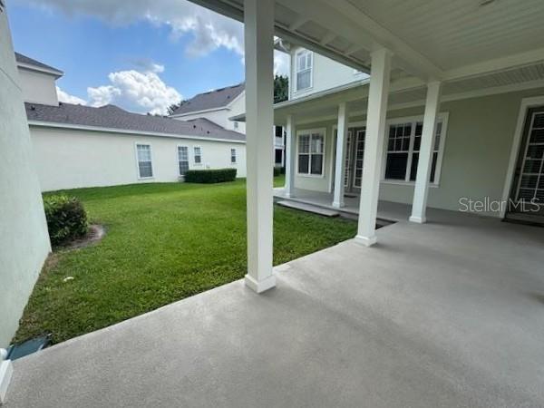 1442 Stickley Avenue Celebration, FL 34747 - Photo 41 of 46 a view of a house with a back yard