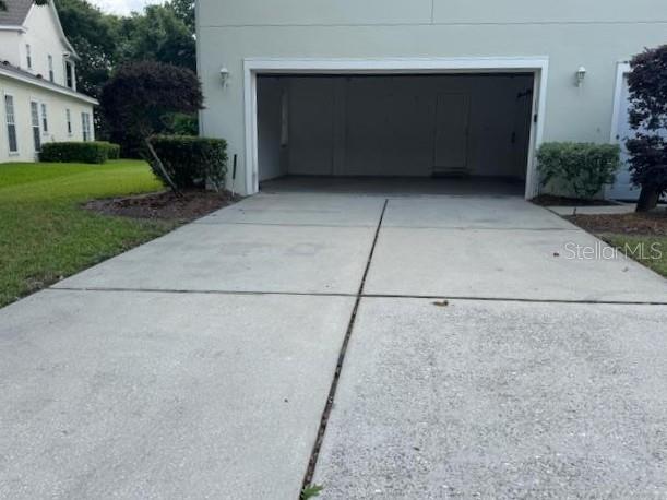 1442 Stickley Avenue Celebration, FL 34747 - Photo 42 of 46 front view of a house with a yard