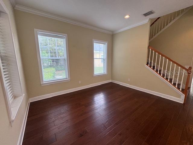 1442 Stickley Avenue Celebration, FL 34747 - Photo 7 of 46 an empty room with wooden floor and windows
