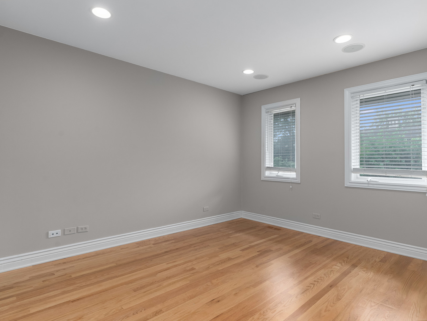 471 River Bend Road, Unit 107 Naperville, IL 60540 - Photo 21 of 31 a view of empty room with wooden floor and fan