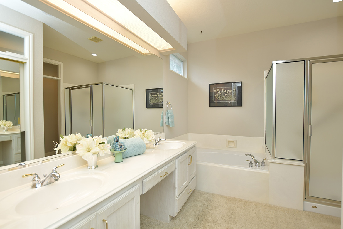 114 Lone Star Drive Georgetown, TX 78633 - Photo 23 of 30 A seated vanity makes getting ready for your day easy in this primary bathroom.