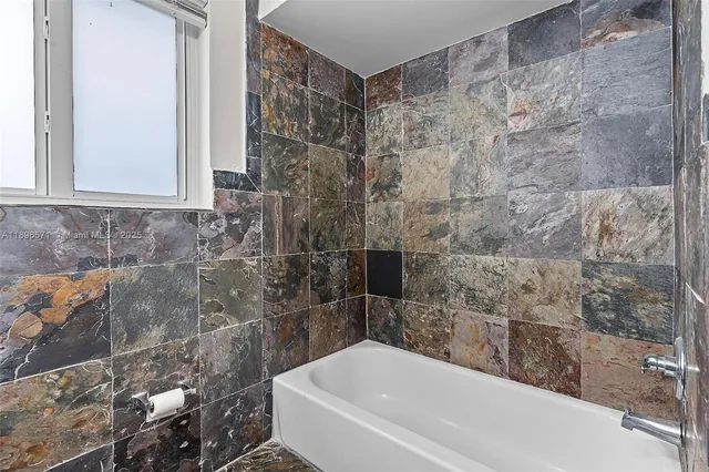 a view of an house with backyard outdoor seating and green space