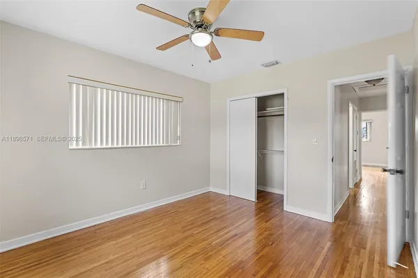 a view of a backyard with a garden and plants