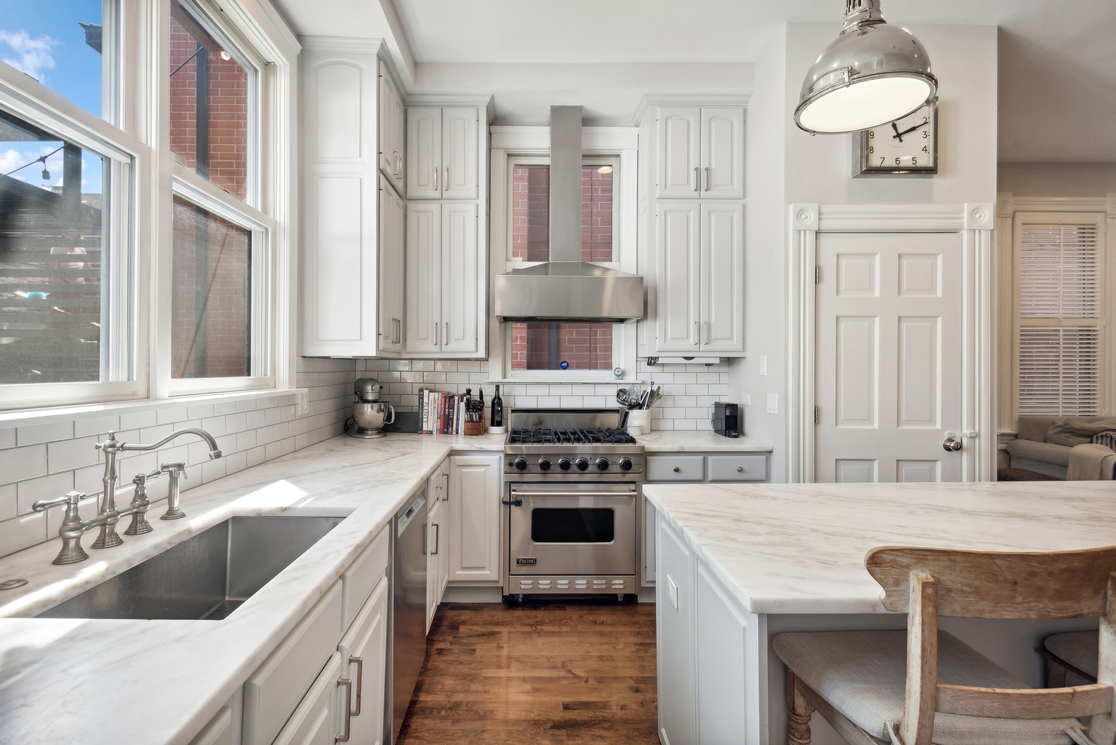 2511 North Burling Street Chicago, IL 60614 - Photo 12 of 37 a kitchen with a stove a sink and a refrigerator