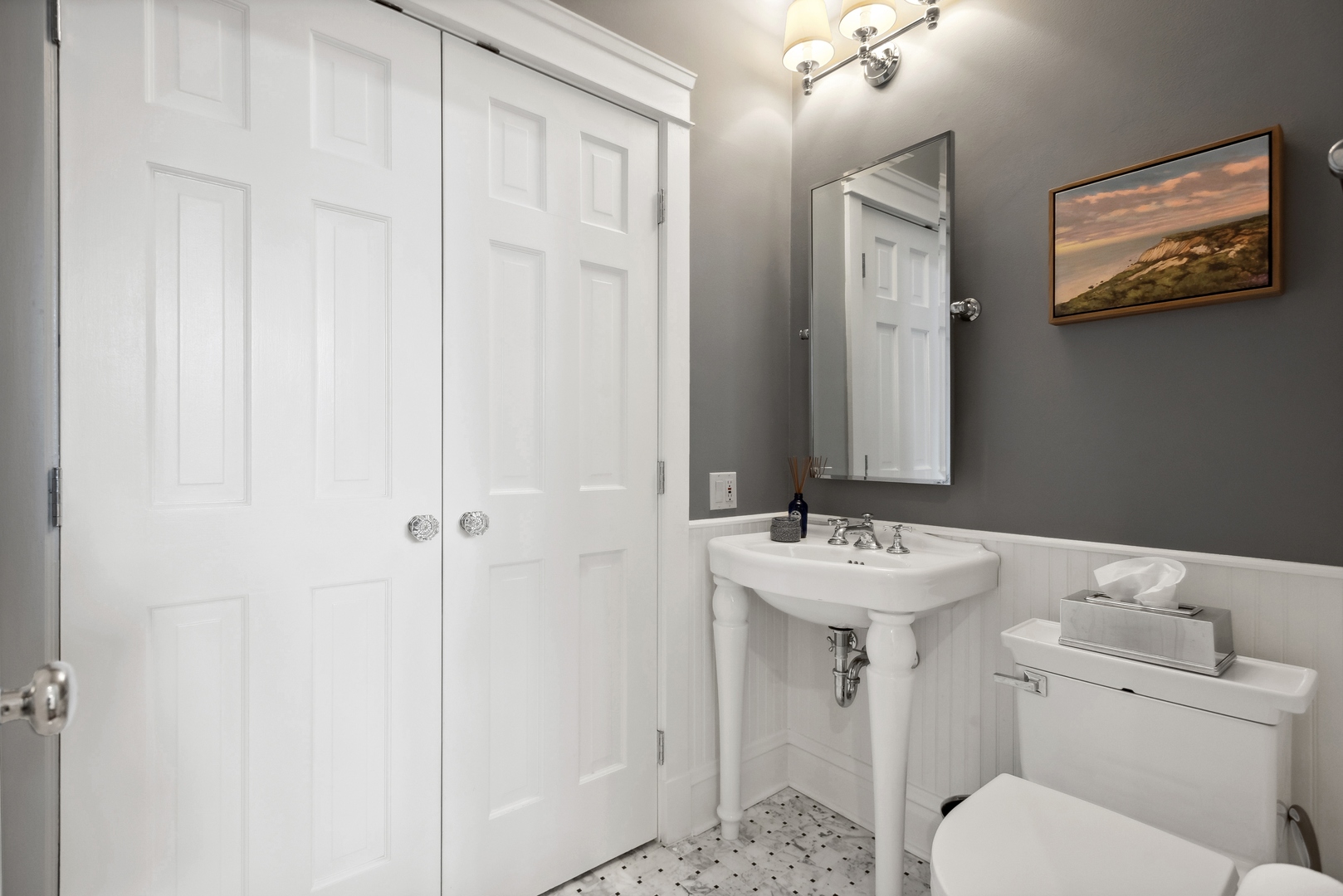 2511 North Burling Street Chicago, IL 60614 - Photo 13 of 37 a bathroom with a sink toilet and a mirror