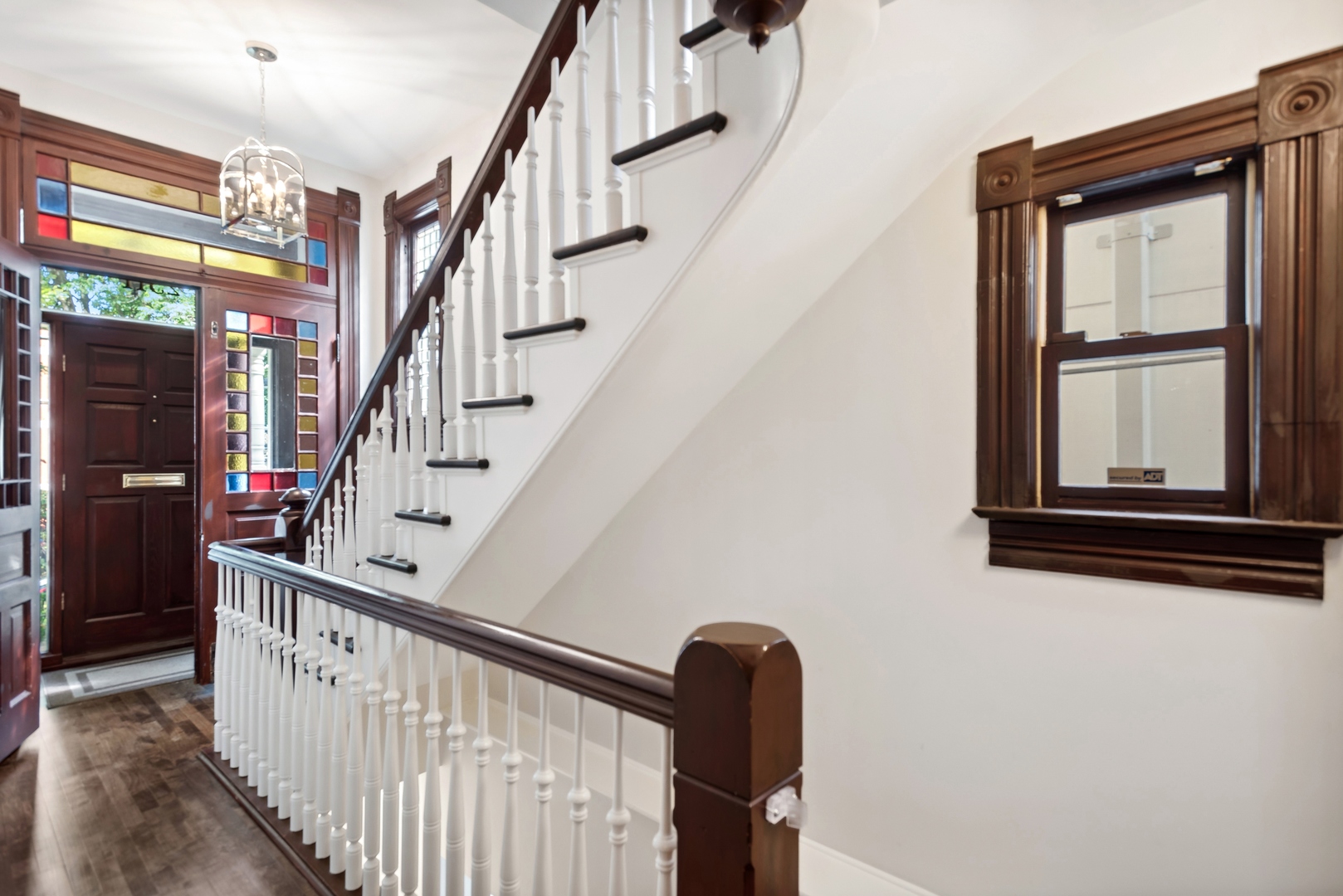 2511 North Burling Street Chicago, IL 60614 - Photo 14 of 37 a view of entryway with wooden floor and windows