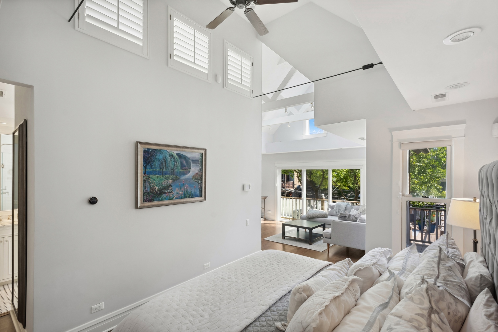 2511 North Burling Street Chicago, IL 60614 - Photo 17 of 37 a bedroom with furniture and a window