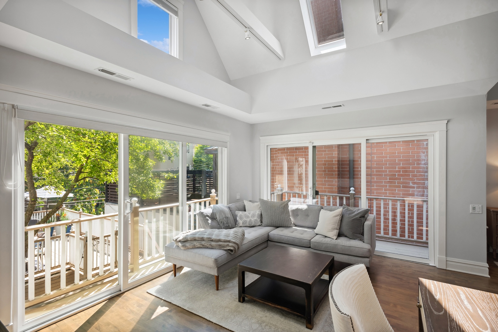 2511 North Burling Street Chicago, IL 60614 - Photo 19 of 37 a living room with furniture and floor to ceiling windows