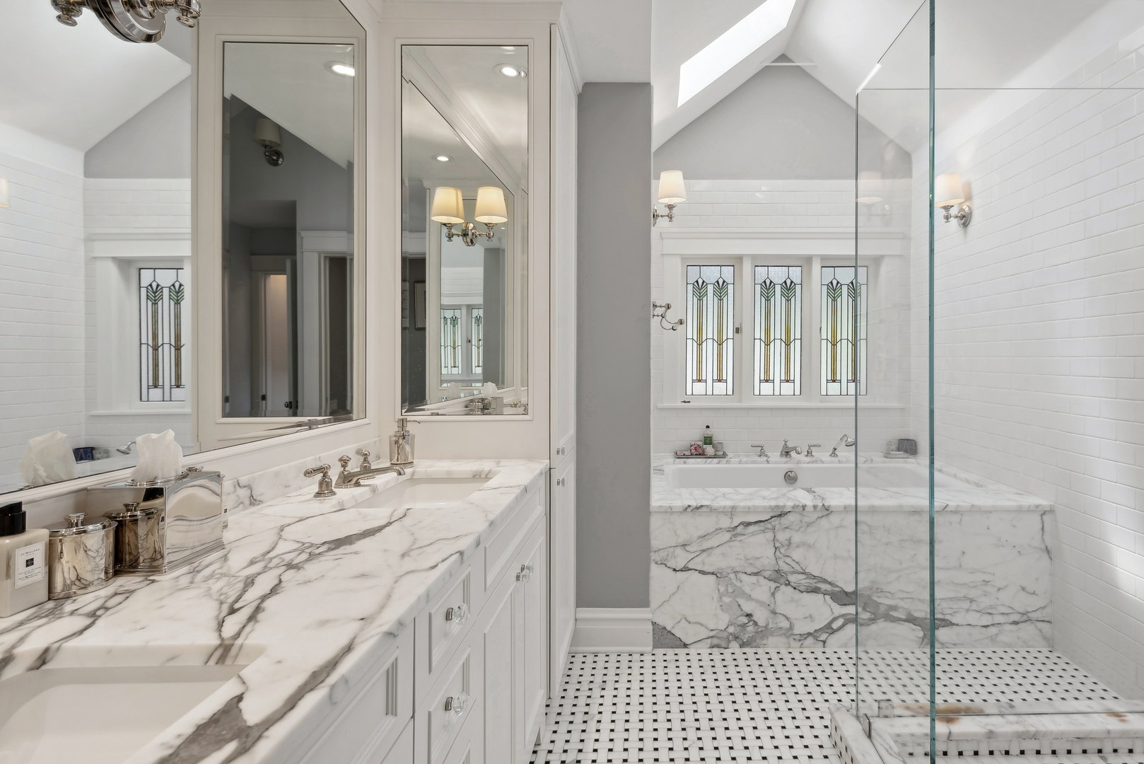 2511 North Burling Street Chicago, IL 60614 - Photo 21 of 37 a bathroom with a sink double vanity and a shower