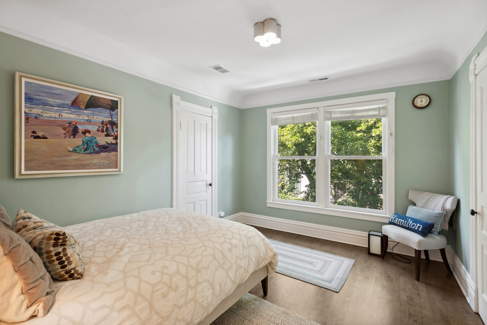 2511 North Burling Street Chicago, IL 60614 - Photo 23 of 37 a bedroom with a bed and a large window