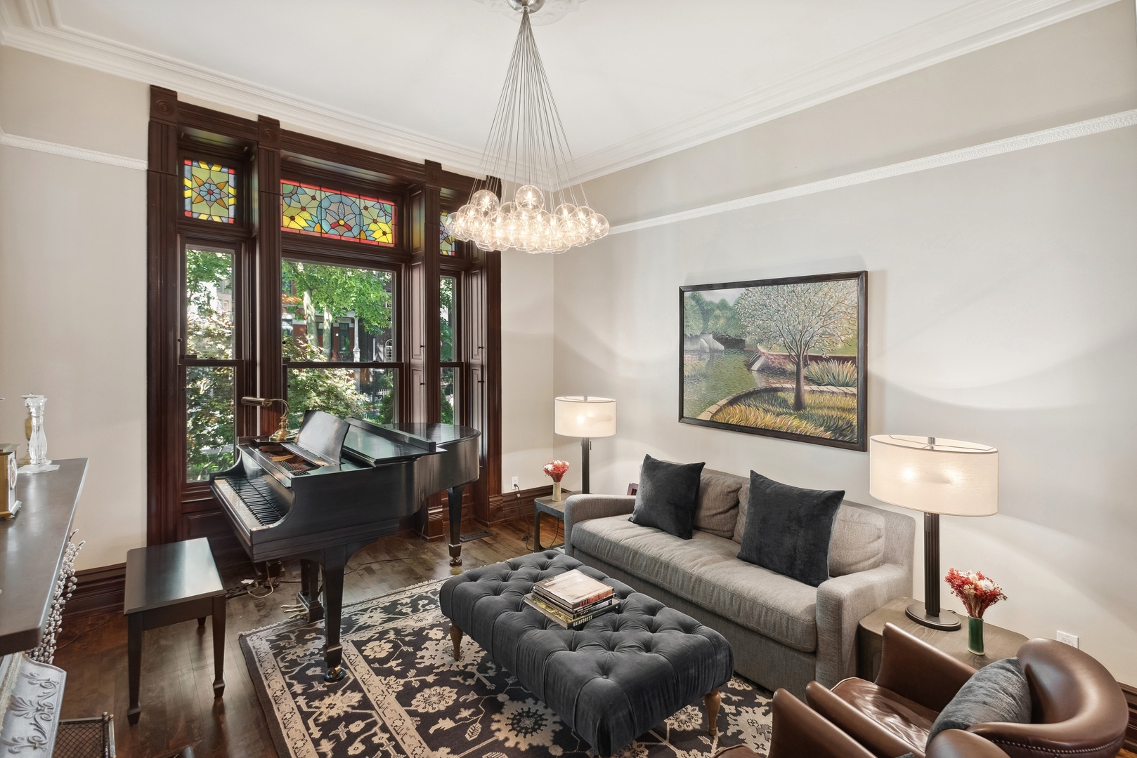 2511 North Burling Street Chicago, IL 60614 - Photo 3 of 37 a living room with furniture and a chandelier