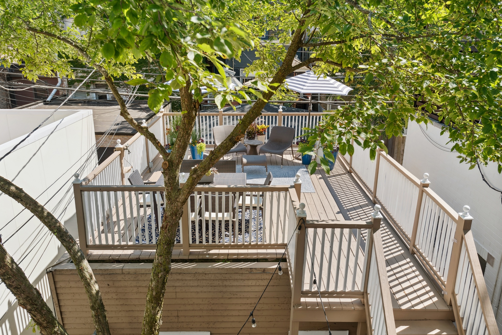 2511 North Burling Street Chicago, IL 60614 - Photo 33 of 37 a view of a patio with iron fence
