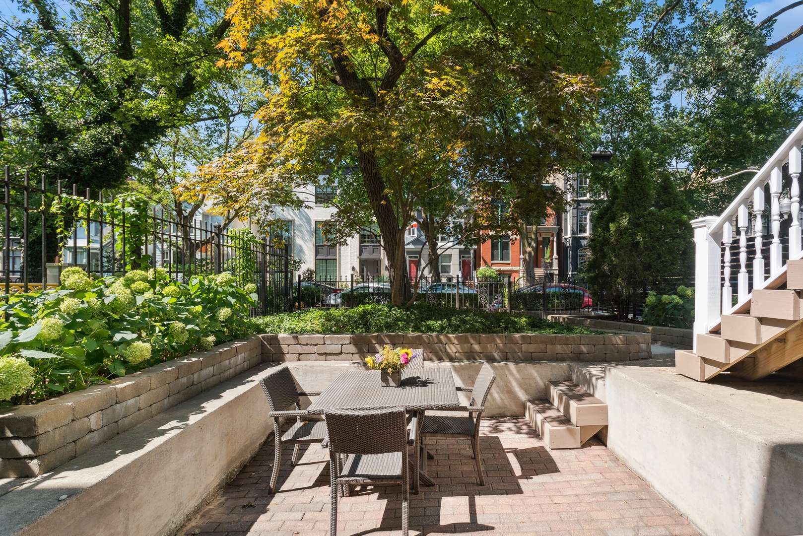 2511 North Burling Street Chicago, IL 60614 - Photo 34 of 37 a view of a patio with couches table and chairs and potted plants