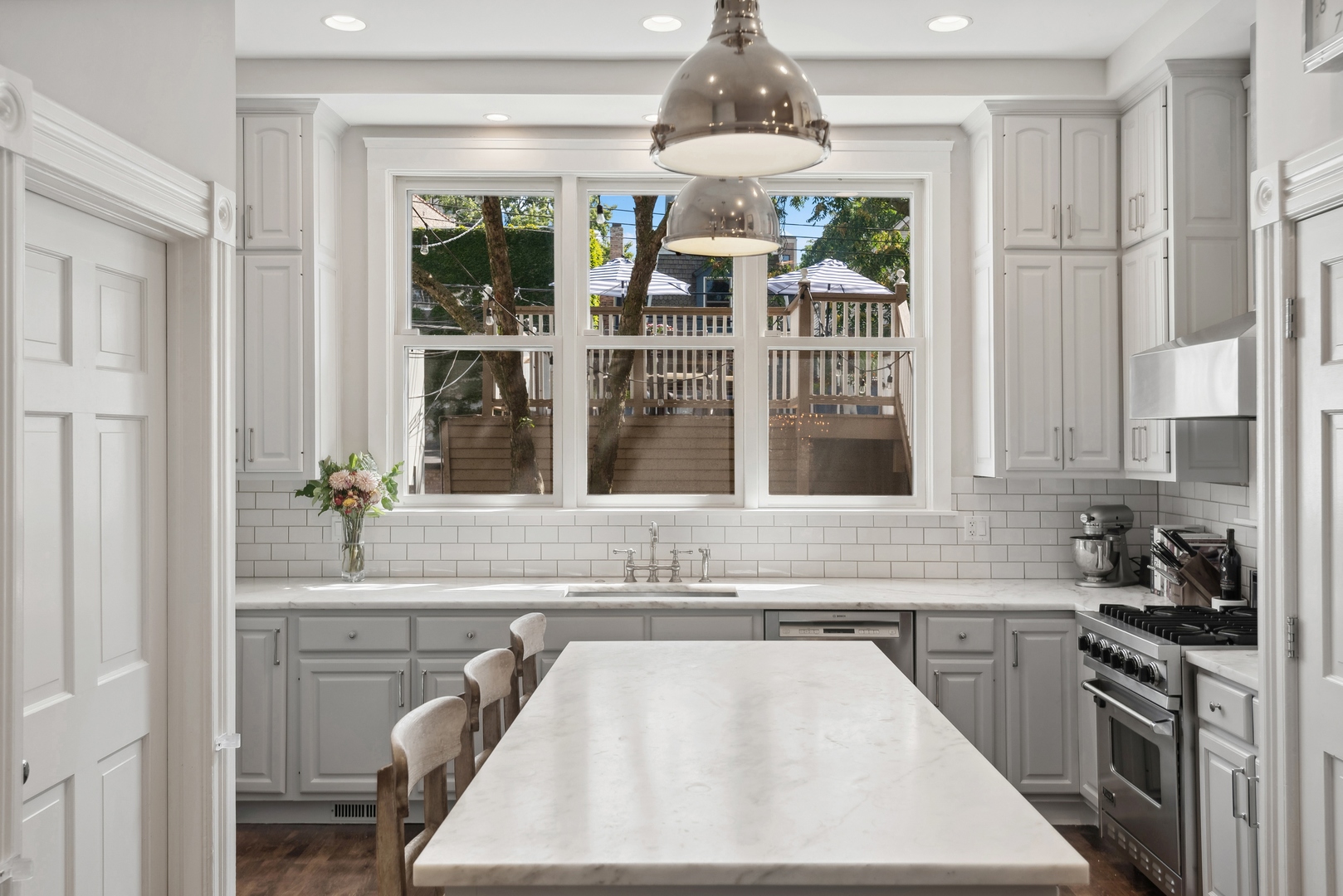 2511 North Burling Street Chicago, IL 60614 - Photo 10 of 37 a kitchen with a refrigerator a sink and cabinets