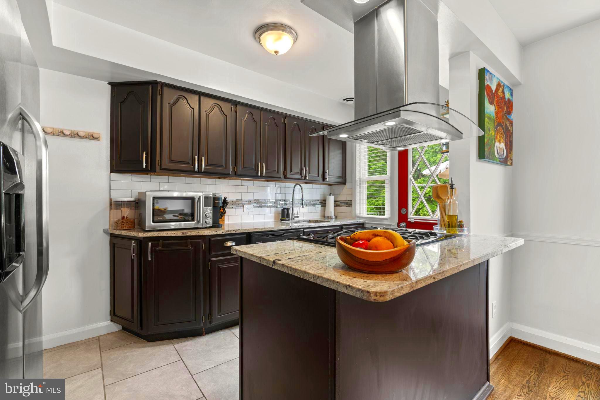 1126 Elm Road Baltimore, MD 21227 - Photo 4 of 30 Updated kitchen with ceramic flooring
