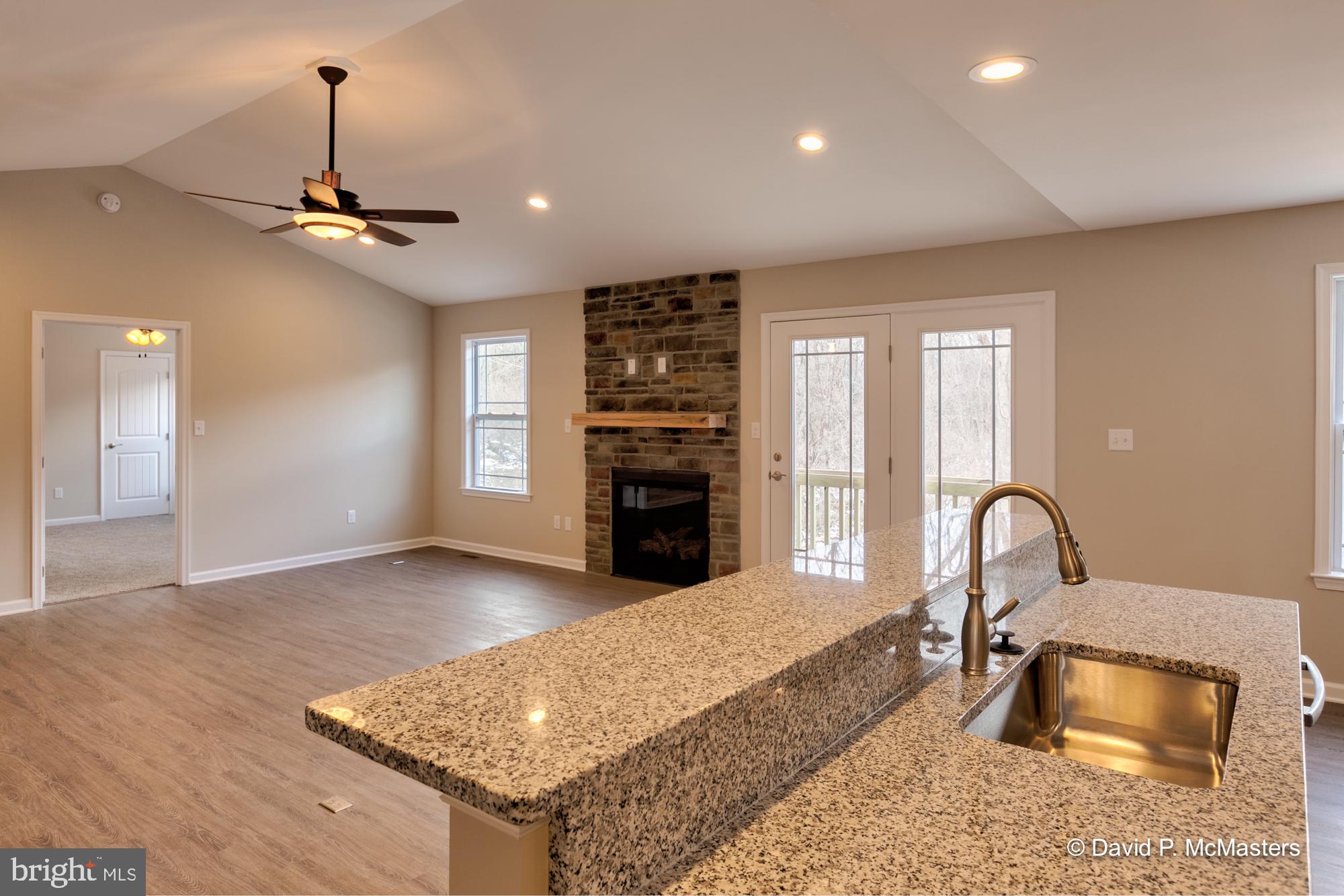 194 Dimension Road Inwood, WV 25428 - Photo 15 of 26 a kitchen with sink refrigerator and stove